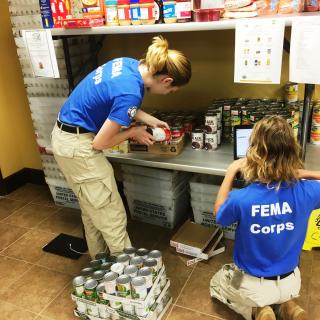 FEMA Corps team members collect canned goods for the “Feds Feed Families Campaign”