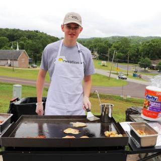 Will Coyne, of Operation Breakfast, serving meals to disaster survivors in West Plains.